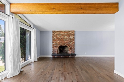 11427 35 Avenue Nw, Edmonton, AB - Indoor Photo Showing Other Room With Fireplace