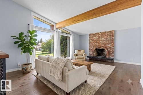 11427 35 Avenue Nw, Edmonton, AB - Indoor Photo Showing Living Room With Fireplace