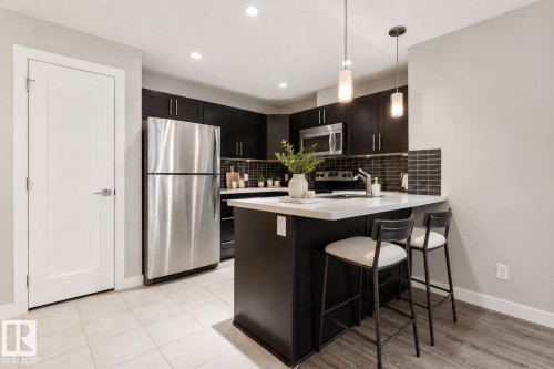 #118 1031 173 St Sw, Edmonton, AB - Indoor Photo Showing Kitchen With Stainless Steel Kitchen With Upgraded Kitchen