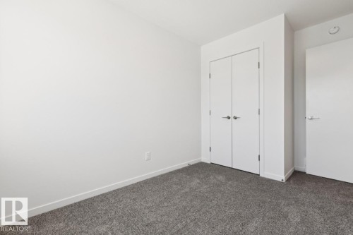 7444 Klapstein Crescent Sw, Edmonton, AB - Indoor Photo Showing Other Room