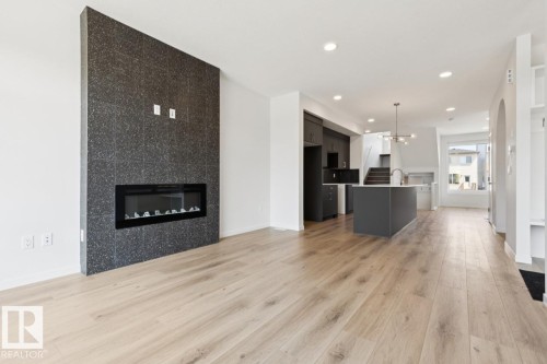 7444 Klapstein Crescent Sw, Edmonton, AB - Indoor With Fireplace