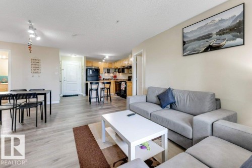 #233 3425 19 St Nw, Edmonton, AB - Indoor Photo Showing Living Room