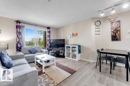 #233 3425 19 St Nw, Edmonton, AB - Indoor Photo Showing Living Room