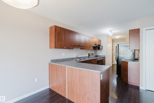 81 Haney Landing, Spruce Grove, AB - Indoor Photo Showing Kitchen With Double Sink