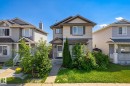 Two-story residence featuring light gray siding with dark trim accents and a contrasting roof - 4317 152 Avenue Nw, Edmonton, AB  - Outdoor With Facade 