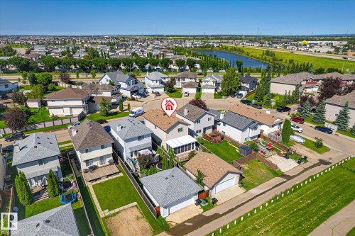 Aerial view showcasing a residential neighborhood with a variety of single-family homes, each featuring individual yards - 4317 152 Avenue Nw, Edmonton, AB - Outdoor With View