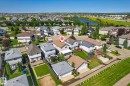 Aerial view showcasing a residential neighborhood with a variety of single-family homes, each featuring individual yards - 4317 152 Avenue Nw, Edmonton, AB  - Outdoor With View 