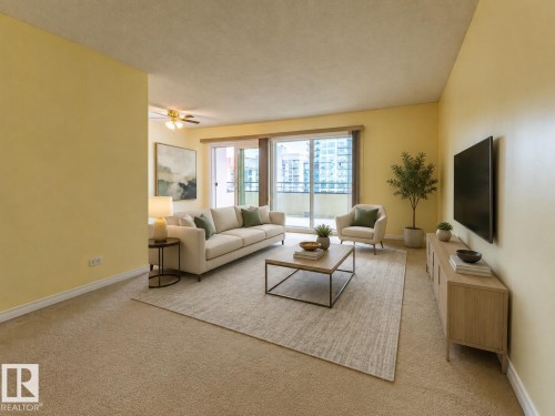 Spacious living area featuring light-toned carpeting and neutral wall colors - #1210 10140 120 St Nw, Edmonton, AB - Indoor Photo Showing Living Room