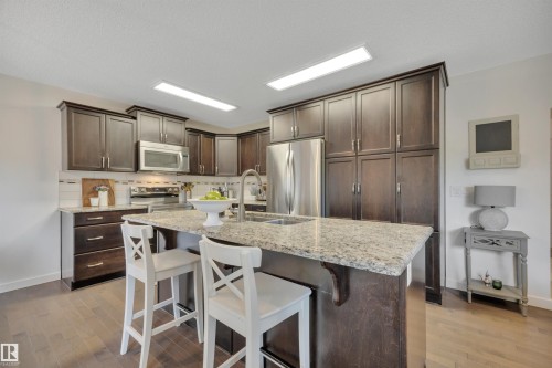 4029 Alexander Way Sw, Edmonton, AB - Indoor Photo Showing Kitchen With Stainless Steel Kitchen With Double Sink With Upgraded Kitchen
