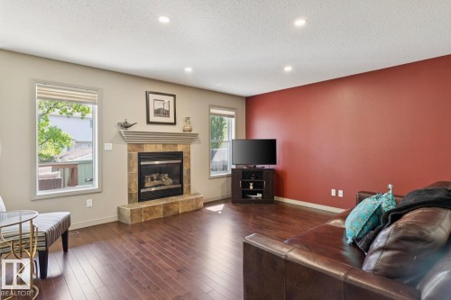 861 Graham Wynd, Edmonton, AB - Indoor Photo Showing Living Room With Fireplace
