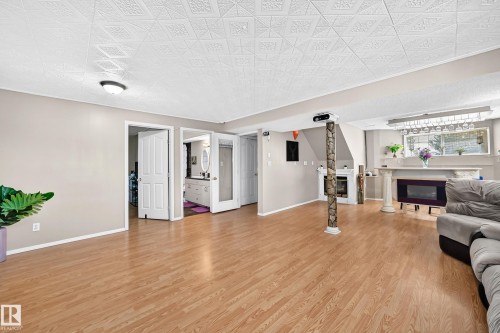 251 Dunvegan Road Nw, Edmonton, AB - Indoor With Fireplace