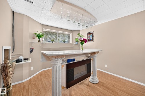 251 Dunvegan Road Nw, Edmonton, AB - Indoor Photo Showing Other Room With Fireplace