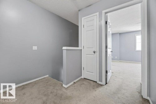 #7 8304 11 Av Sw, Edmonton, AB - Indoor Photo Showing Other Room
