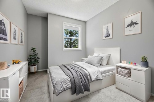 #7 8304 11 Av Sw, Edmonton, AB - Indoor Photo Showing Bedroom