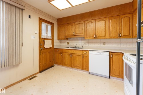 8502 76 Avenue Nw, Edmonton, AB - Indoor Photo Showing Kitchen With Double Sink