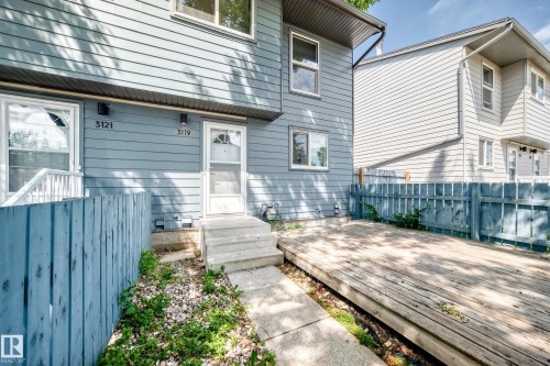 Rear wood deck with a partial wooden fence - 3119 144 Avenue Nw, Edmonton, AB - Outdoor