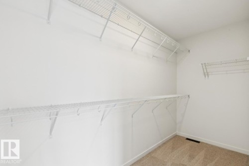 7449 Klapstein Crescent Sw, Edmonton, AB - Indoor With Storage