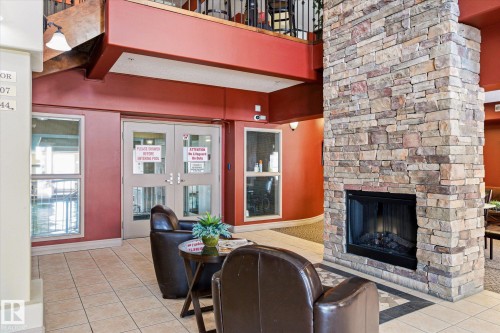 #103 45 Inglewood Dr, St. Albert, AB - Indoor Photo Showing Living Room With Fireplace
