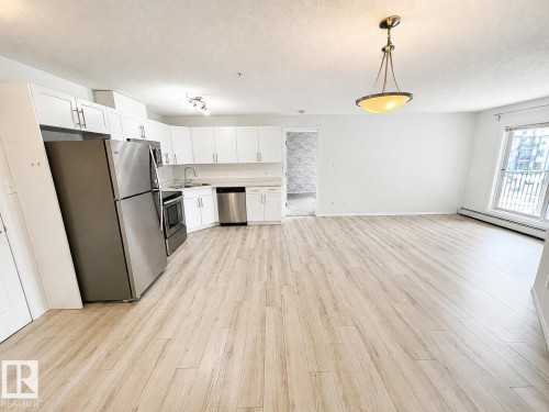 #244 301 Clareview Station Dr Nw, Edmonton, AB - Indoor Photo Showing Kitchen With Stainless Steel Kitchen
