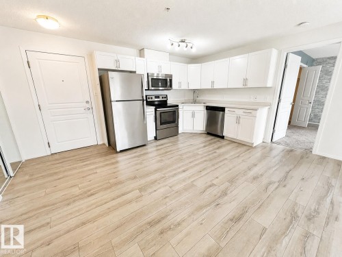 #244 301 Clareview Station Dr Nw, Edmonton, AB - Indoor Photo Showing Kitchen With Stainless Steel Kitchen