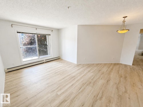 #244 301 Clareview Station Dr Nw, Edmonton, AB - Indoor Photo Showing Living Room