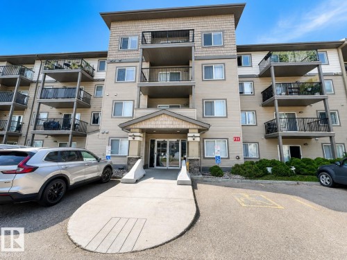 #244 301 Clareview Station Dr Nw, Edmonton, AB - Outdoor With Balcony With Facade