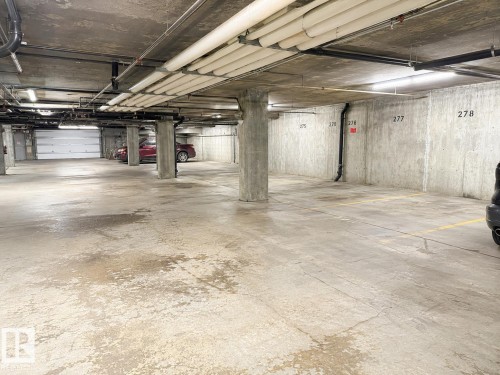 #244 301 Clareview Station Dr Nw, Edmonton, AB - Indoor Photo Showing Garage