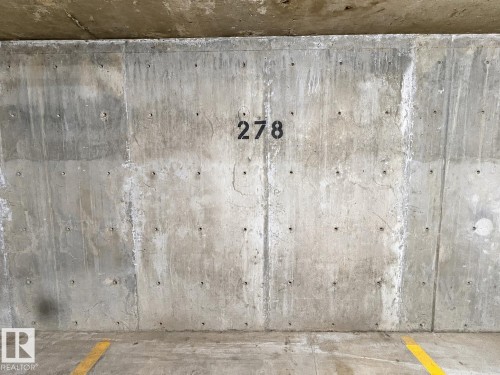 #244 301 Clareview Station Dr Nw, Edmonton, AB - Indoor Photo Showing Garage