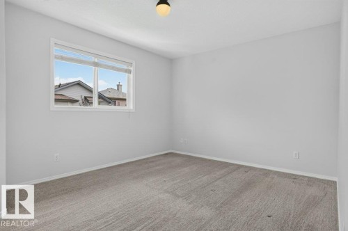 #10 2816 34 Av Nw, Edmonton, AB - Indoor Photo Showing Other Room
