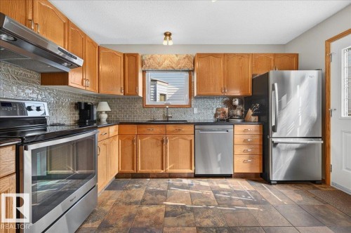 10 Westmews, Fort Saskatchewan, AB - Indoor Photo Showing Kitchen With Stainless Steel Kitchen