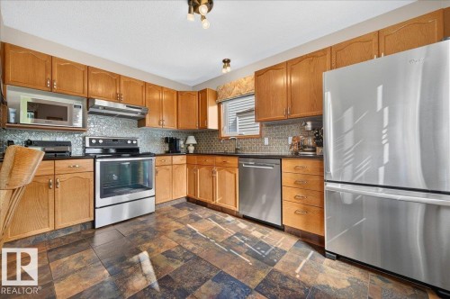 10 Westmews, Fort Saskatchewan, AB - Indoor Photo Showing Kitchen With Stainless Steel Kitchen