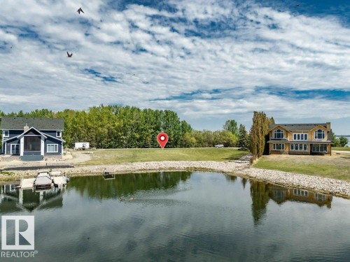 Expansive lot featuring a waterfront - 12 Sunset Harbour, Rural Wetaskiwin County, AB 