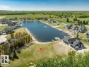 Expansive lakeside property featuring a level building site, direct water frontage - 12 Sunset Harbour, Rural Wetaskiwin County, AB 
