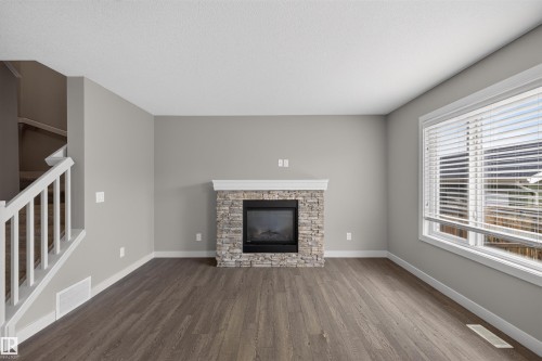 1107 162 Street Sw, Edmonton, AB - Indoor Photo Showing Living Room With Fireplace