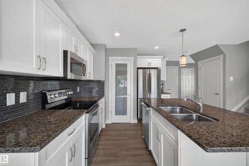 1107 162 Street Sw, Edmonton, AB - Indoor Photo Showing Kitchen With Double Sink With Upgraded Kitchen