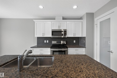 1107 162 Street Sw, Edmonton, AB - Indoor Photo Showing Kitchen With Double Sink With Upgraded Kitchen