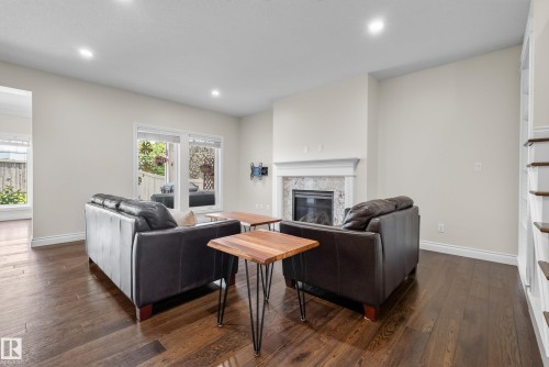 6311 Mann Place Nw, Edmonton, AB - Indoor Photo Showing Living Room With Fireplace