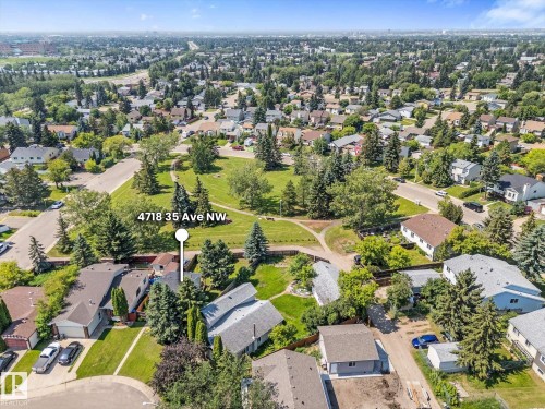 Aerial perspective showcasing a residential neighborhood with ample green spaces - 4718 35 Avenue Nw, Edmonton, AB - Outdoor With View