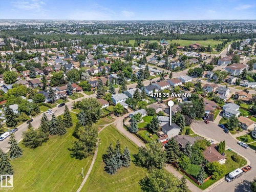 Aerial perspective of a residential neighborhood with a prominent green space - 4718 35 Avenue Nw, Edmonton, AB - Outdoor With View
