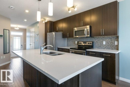 3119 Carpenter Landing Landing, Edmonton, AB - Indoor Photo Showing Kitchen With Stainless Steel Kitchen With Double Sink With Upgraded Kitchen