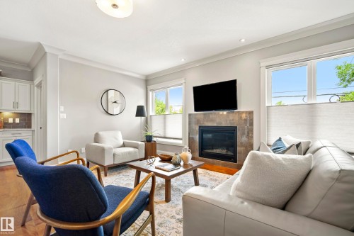 9844 75 Avenue Nw, Edmonton, AB - Indoor Photo Showing Living Room With Fireplace