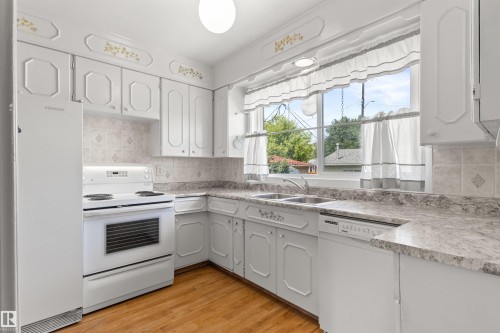 12316 135 Avenue Nw, Edmonton, AB - Indoor Photo Showing Kitchen With Double Sink