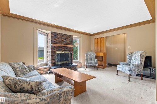 12316 135 Avenue Nw, Edmonton, AB - Indoor Photo Showing Living Room With Fireplace