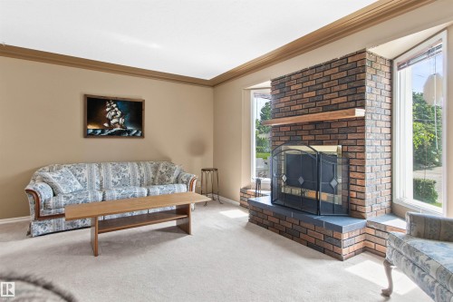 12316 135 Avenue Nw, Edmonton, AB - Indoor Photo Showing Living Room With Fireplace