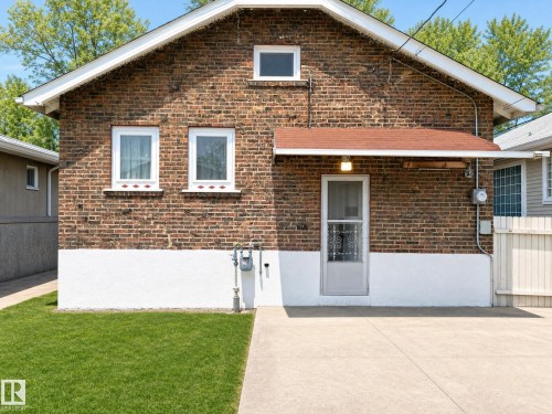 Virtually decluttered and staged. Existing appliances, cabinets, and wall colors are retained to highlight the home's potential. - 11405 97 Street Nw, Edmonton, AB - Outdoor With Exterior