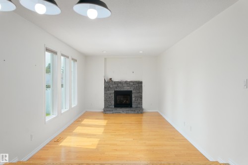 5407 60 Ave, Barrhead, AB - Indoor Photo Showing Living Room With Fireplace