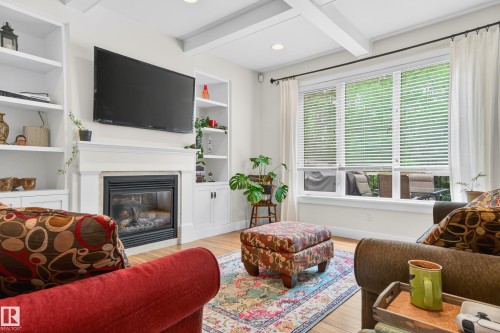 21147 48 Avenue, Edmonton, AB - Indoor Photo Showing Living Room With Fireplace