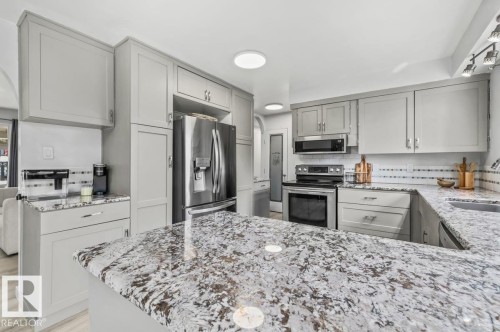 9304 128A Avenue Nw, Edmonton, AB - Indoor Photo Showing Kitchen With Stainless Steel Kitchen