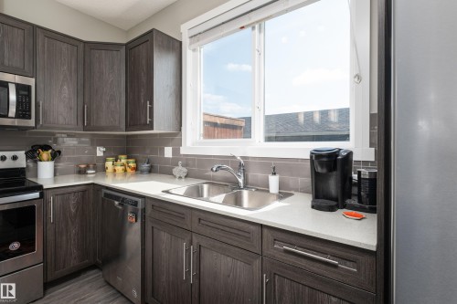 2627 Maple Way Nw, Edmonton, AB - Indoor Photo Showing Kitchen With Double Sink