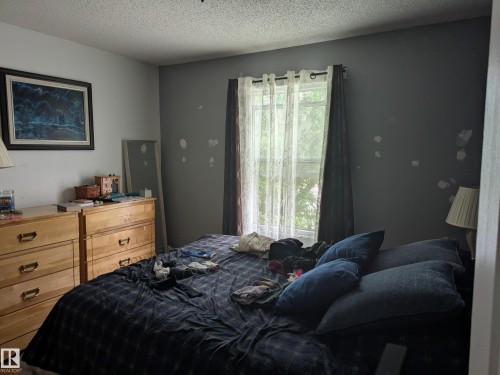 10650 76 Avenue, Edmonton, AB - Indoor Photo Showing Bedroom